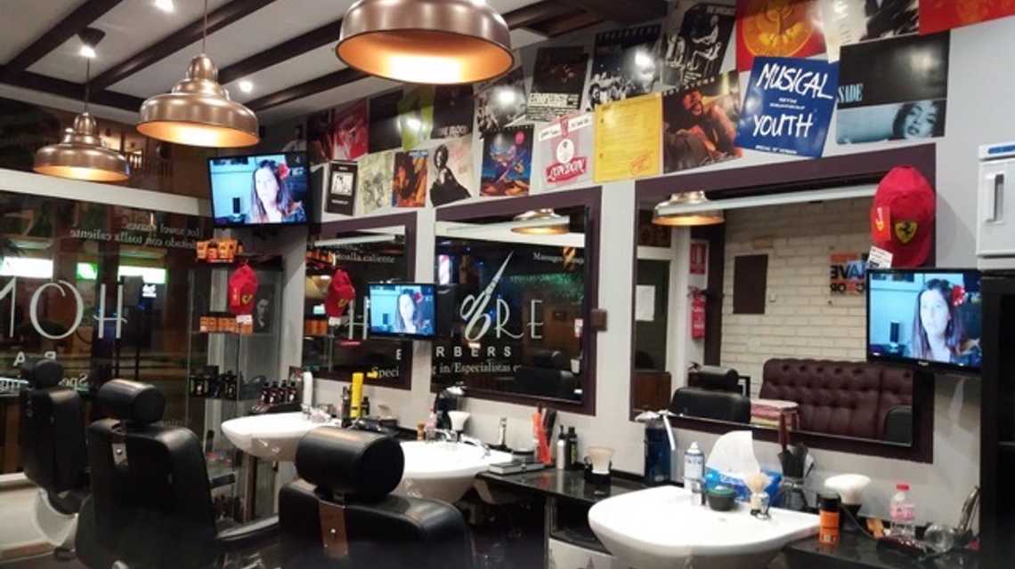 HOMBRE BARBERS cover image