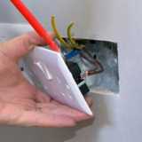 Minhas electric work logo