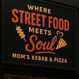 Mom's Kebab & Pizza logo