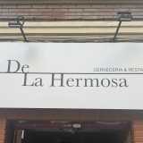 De la Hermosa logo
