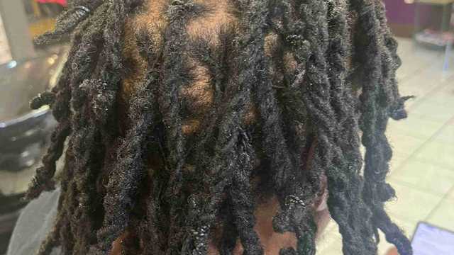 Hair Stylist / Braider with Valid cosmetology or barbering License