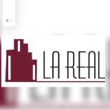 Administracion de Fincas La Real logo