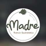 Madre Espacio Gastronómico logo
