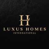 LUXUS HOMES INTERNATIONAL logo