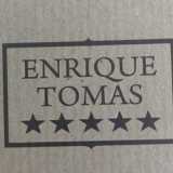 Enrique Tomas logo