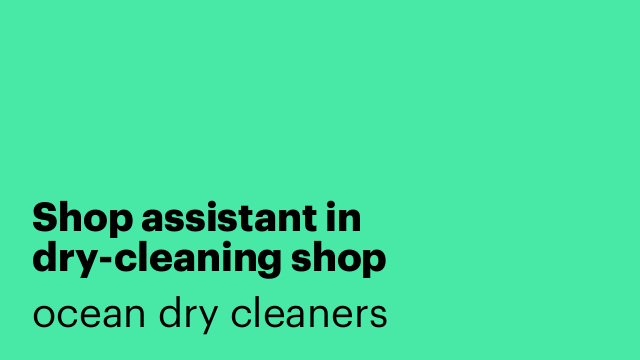 Shop assistant in dry-cleaning shop