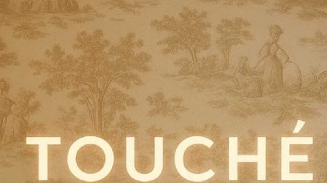 T O U C H É cover image