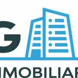 Grupo Hogares Inmobiliarias logo