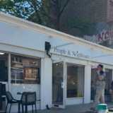 People & Neighbours Café logo