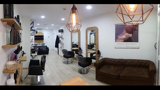 Oficial/a de peluquería