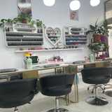 Uñas y Peluqueriq Manuel Bicera logo